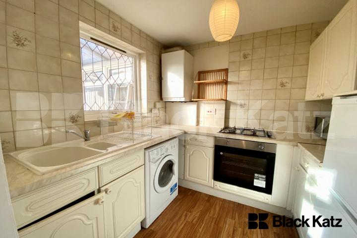 Two bedroomed house with study room, conservatory, parking & charming garden   Kinburn Street, Rotherhithe/Canada Water. 